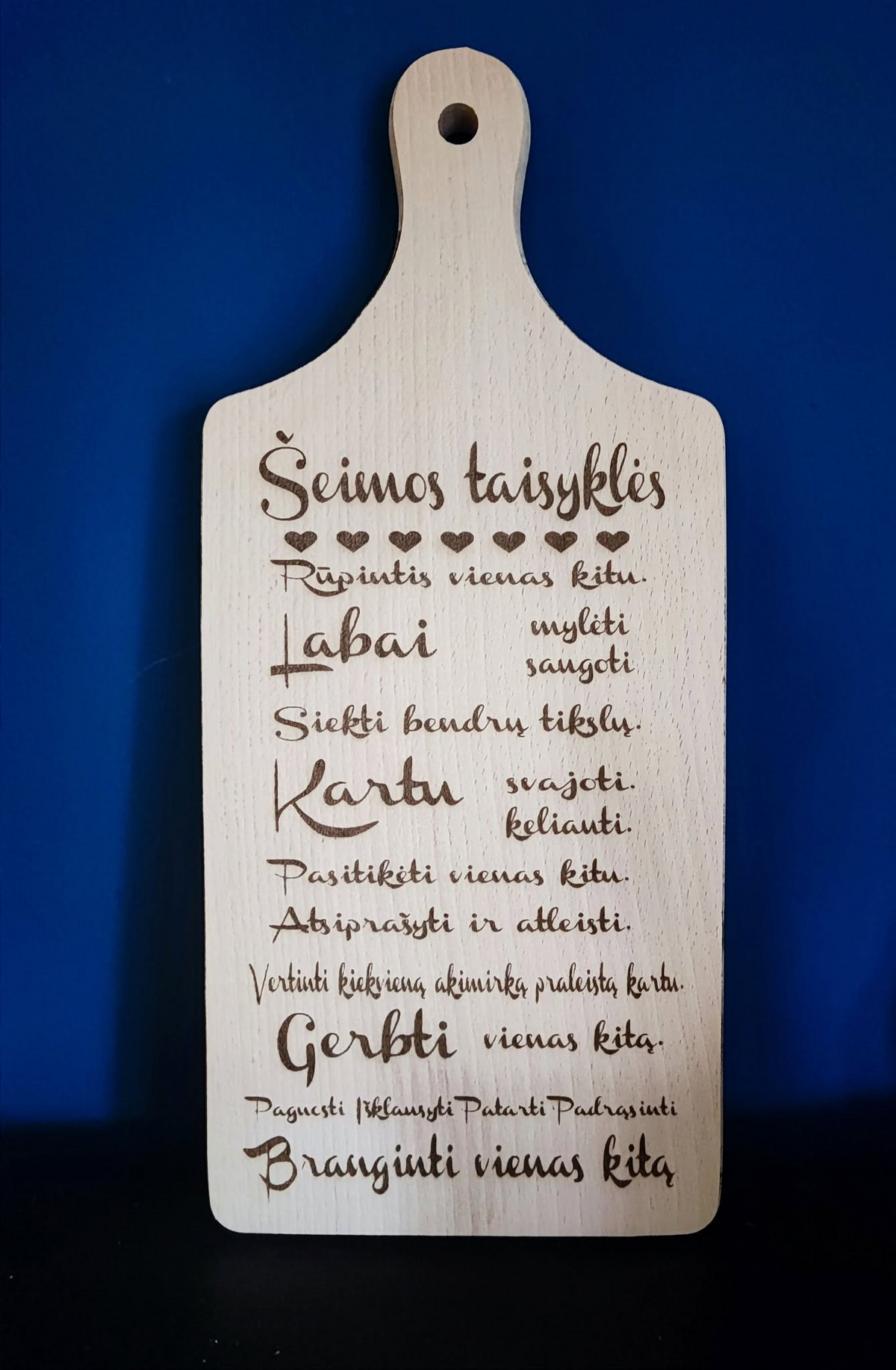 Graviruota medinė lentelė Šeimos taisyklės